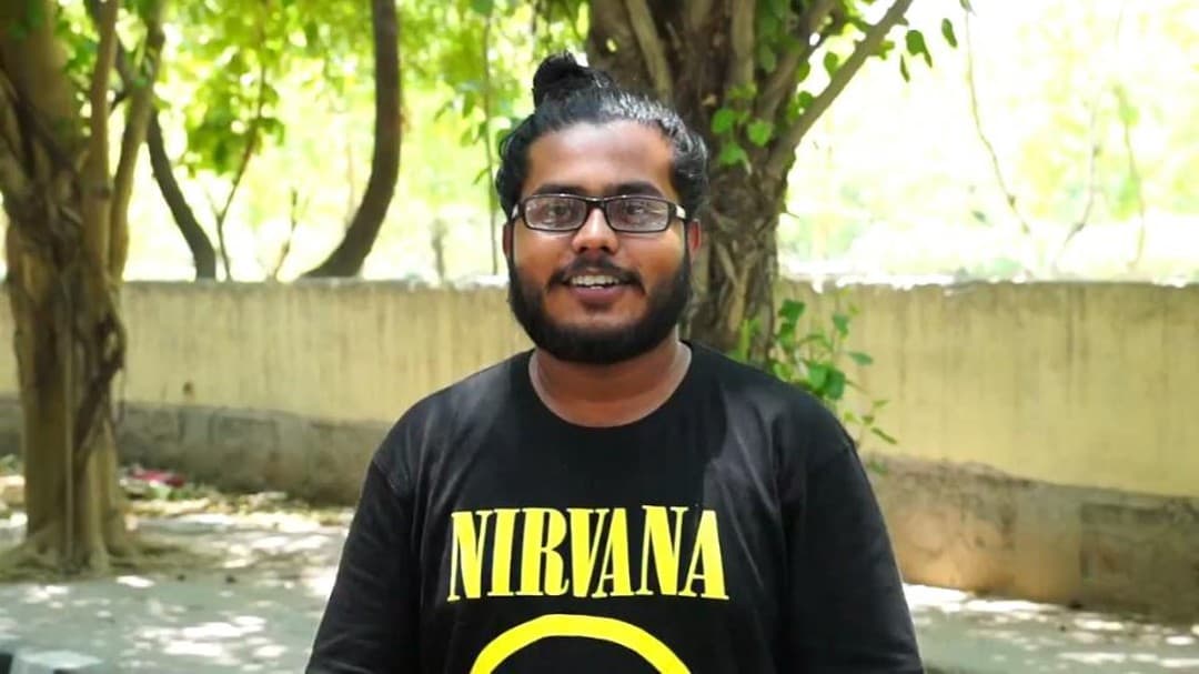 Akio smiling in a Nirvana t-shirt, from the 2017 AkioLife announcement