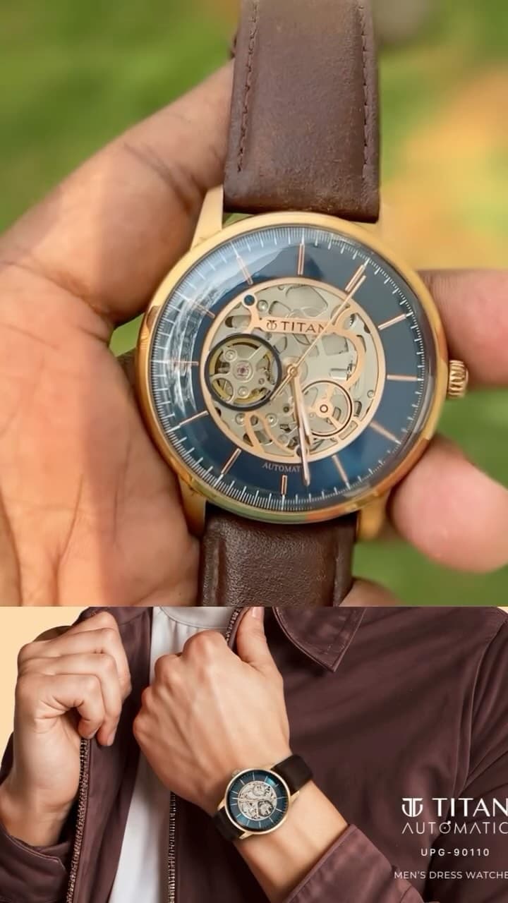 Close-up of a Titan Automatic skeleton watch with a blue dial, rose-gold case and brown leather strap, shown open-dialled to reveal the movement
