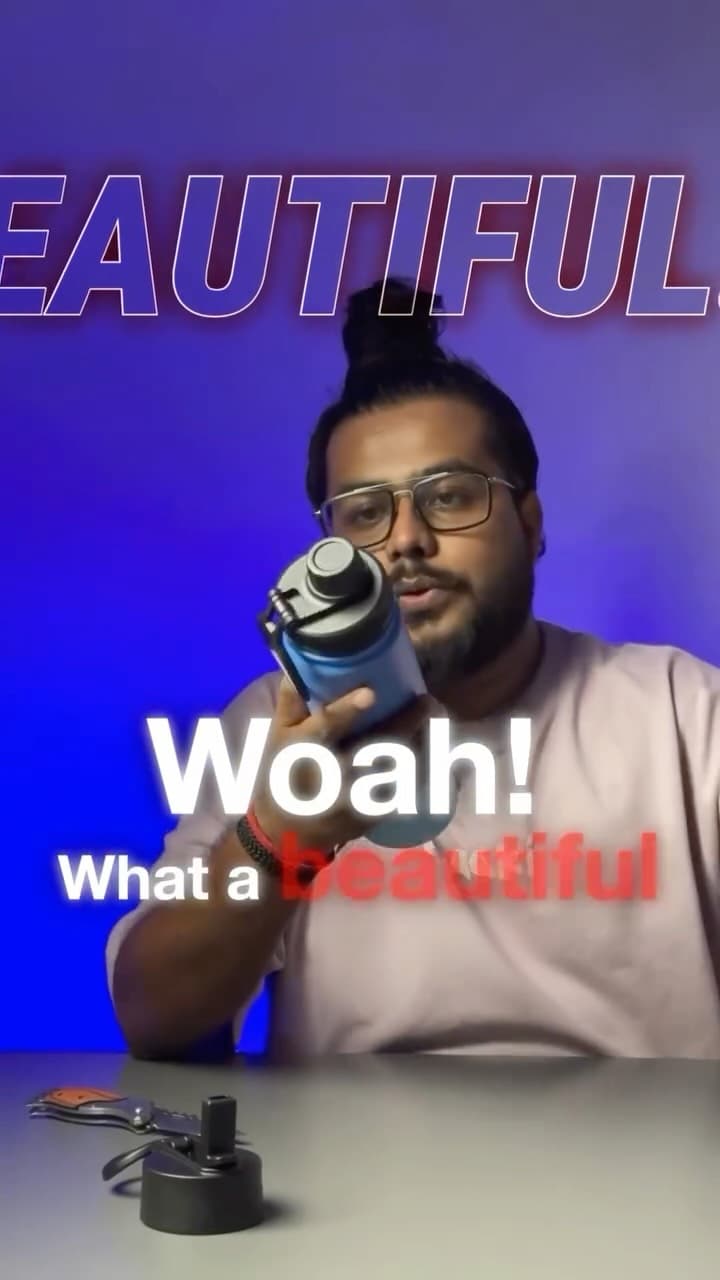 Akio unboxing a dark Solara insulated water bottle with the word Woah on screen