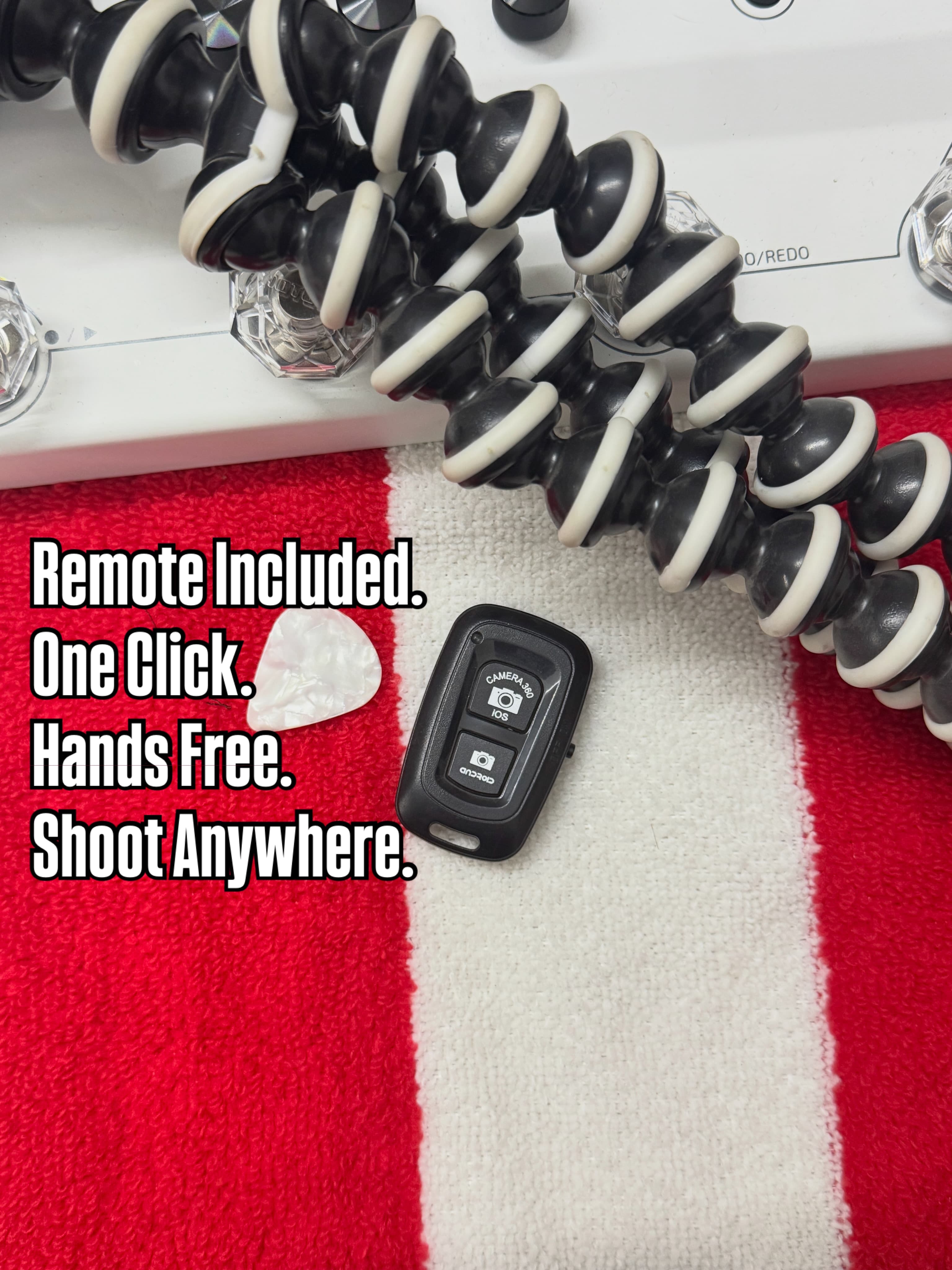 Close-up of the tripod's flexible black and white legs and the small Bluetooth remote