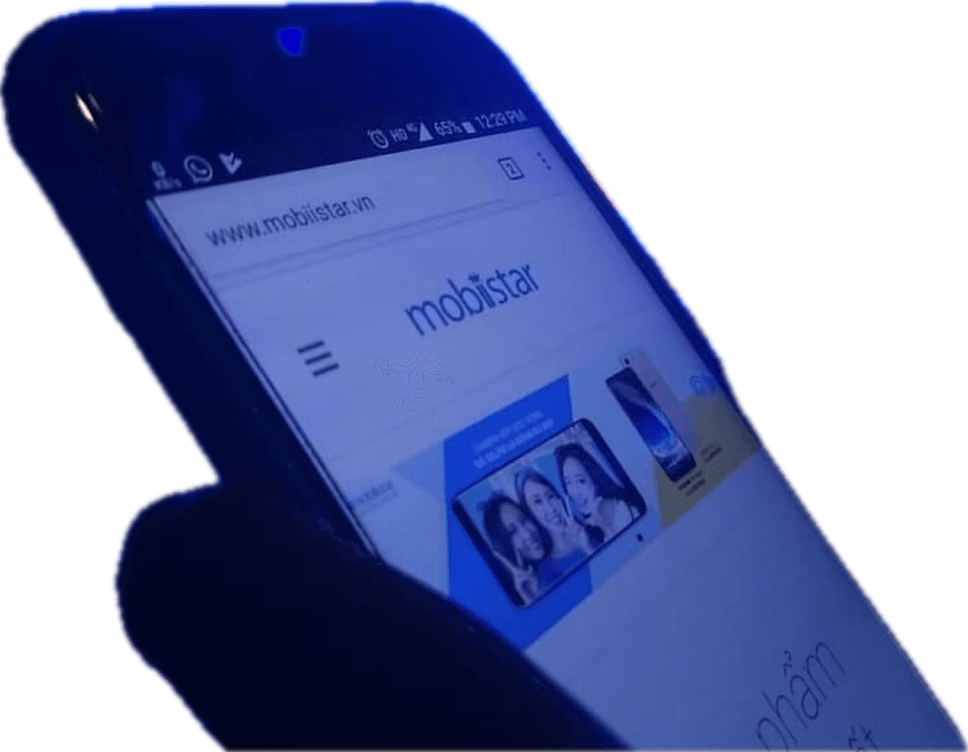 Mobiistar media launch event screen with a presenter