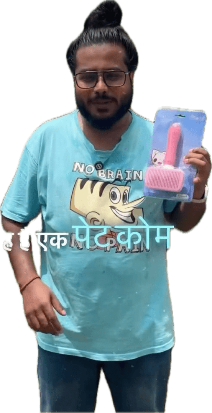 Akio holding the PATPAT slicker pet comb brush outdoors